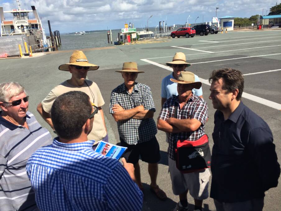Cleveland candidates say the way Toondah Harbour is redeveloped is a priority for voters. 
 Here local residents discuss the development last year with Cleveland MP Mark Robinson (right)