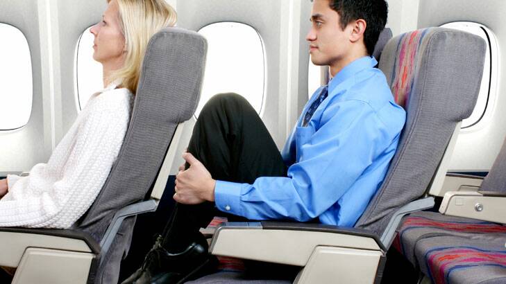 Is it OK to recline your seat on a plane? Yes, but follow the rules to show good manners. Photo: iStock