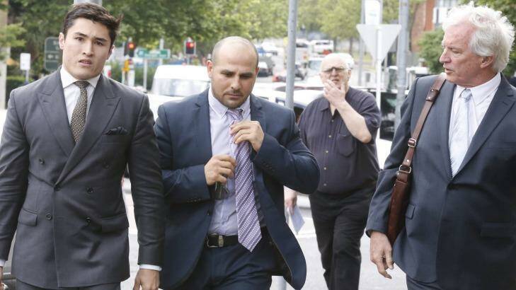 Not guilty plea: Hazem El Masri, centre, arrives at Bankstown Local Court last October. Photo: Peter Rae
