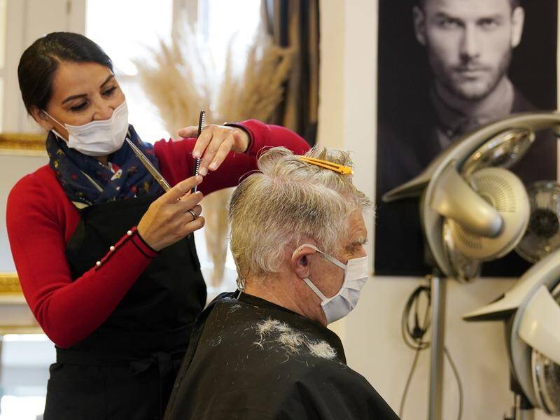 Hairdressers have reopened in Germany as the virus lockdown eases.