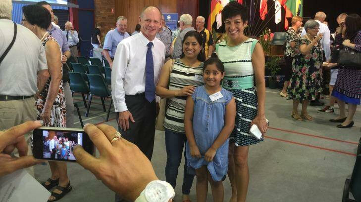 Campbell and Lisa Newman with the Lohani family at The Gap State School. Photo: Amy Remeikis