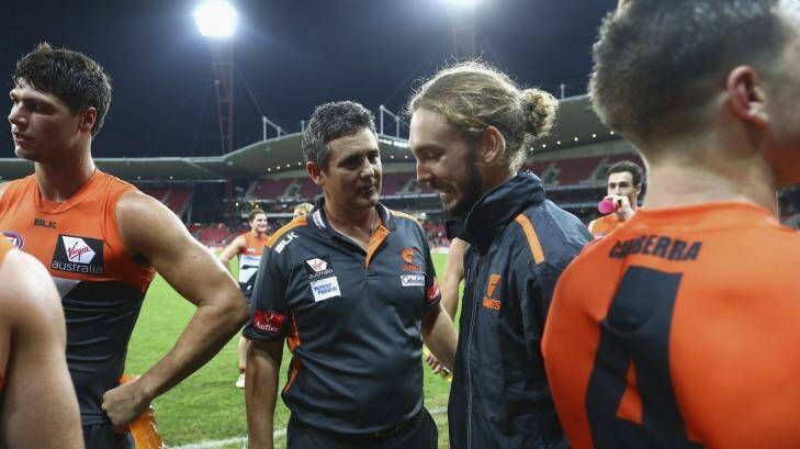 Consoling words: Giants coach Leon Cameron speaks to Matthew Buntine after the win over the Bulldogs. Photo: Getty Images 
