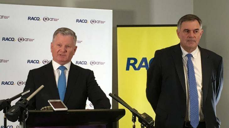 QT Mutual Bank chief executive Steve Targett and RACQ Group chief executive Ian Gillespie announce their merger to create a new banking entity. Photo: Cameron Atfield