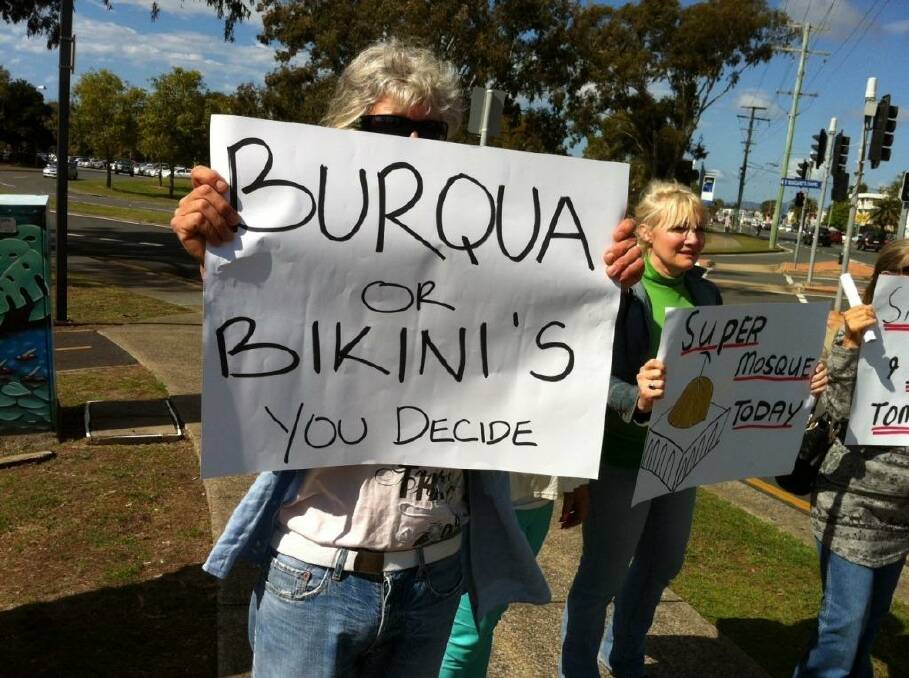 A small group of protesters oppose a proposed mosque
in Currumbin. Photo: Tony Moore