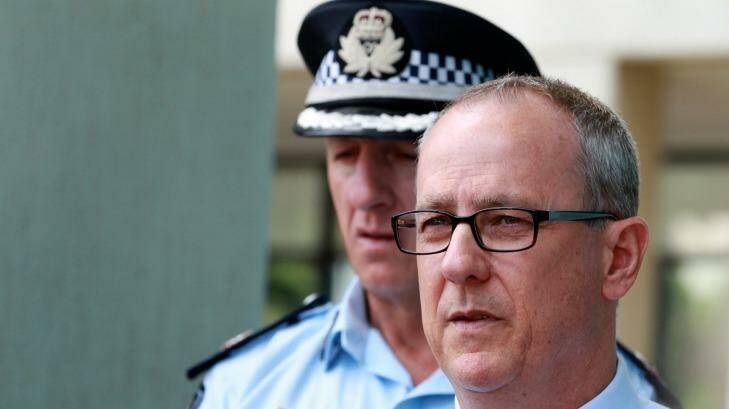 Detective Inspector Bruno Asnicar and Acting Assistant Commissioner Paul Taylor report that the woman has been charged with eight counts of murder.  Photo: Edwina Pickles