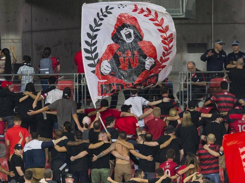A leader from Western Sydney's active fan group has been banned from Olympic Park for 12 months.