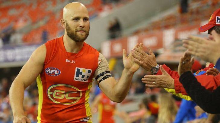 Gary Ablett celebrates the Suns' victory over North Melbourne. Photo: Chris Hyde