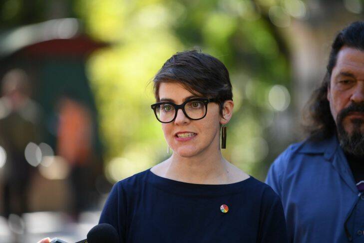 Queensland Greens candidate for South Brisbane, Amy MacMahon talks to the media in Brisbane, Wednesday, August 9, 2017. (AAP Image/Samantha Manchee) NO ARCHIVING