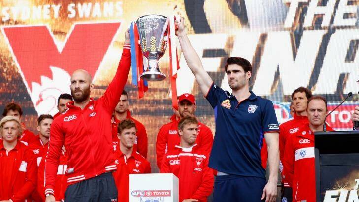 Jarrad McVeigh and Easton Wood hold the premiership cup. Photo: Darrian Traynor