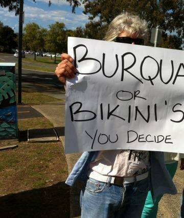 A small group of protesters oppose a proposed mosque
in Currumbin. Photo: Tony Moore