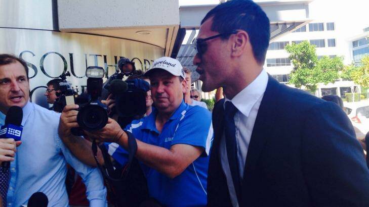 Media greets Karmichael Hunt as he arrives at Southport Magistrates Court. Photo: Kim Stephens