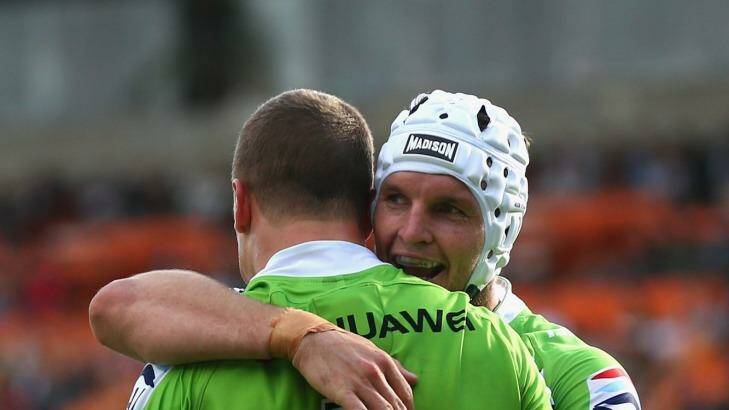 Raiders fullback Jack Wighton is congratulated by skipper Jarrod Croker after scoring a try in last week's win over Wests Tigers.  Photo: Cameron Spencer 