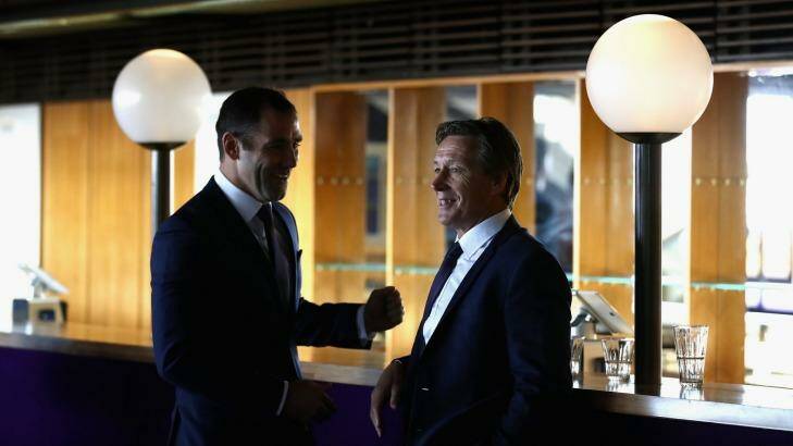 Storm before the calm: Melbourne captain Cameron Smith and coach Craig Bellamy relax prior to the NRL grand final press conference. Photo: Cameron Spencer