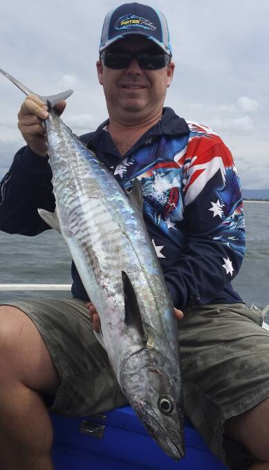 Jason May with a Spanish mackerel caught at Palm Beach Reef off the Gold Coast.