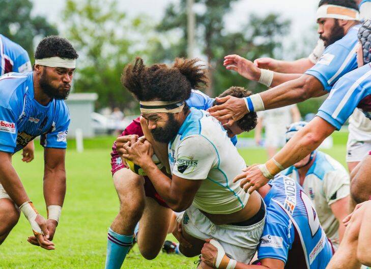 Queanbeyan flanker S. Tai loses the ball as he charges over for an atttempted try. Photo: Sitthixay Ditthavong Photo: Sitthixay Ditthavong
