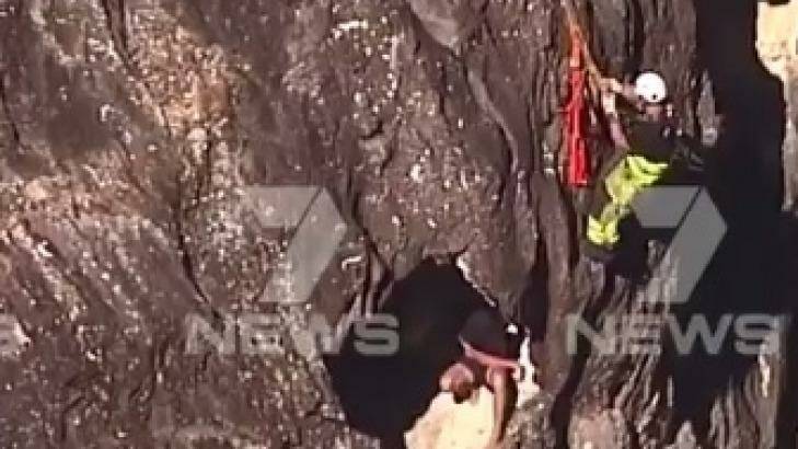 A rescue operation is underway for a person stuck in a crevice at Point Lookout. Photo: 7 News Queensland/Twitter