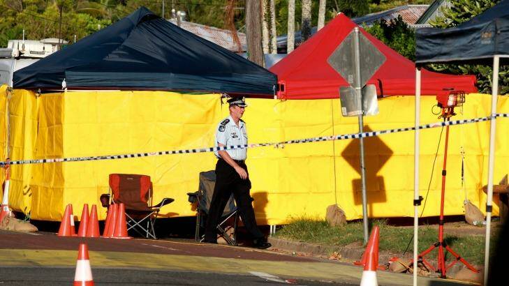 Police at the house where eight children were killed. Photo: Edwina Pickles
