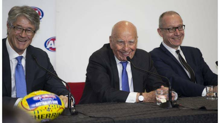 Costly business: News executives Mike Fitzpatrick, Rupert Murdoch and Robert Thompson. News will pay $900m for the NRL pay TV rights from 2018-2022.  Photo: Simon O'Dwyer
