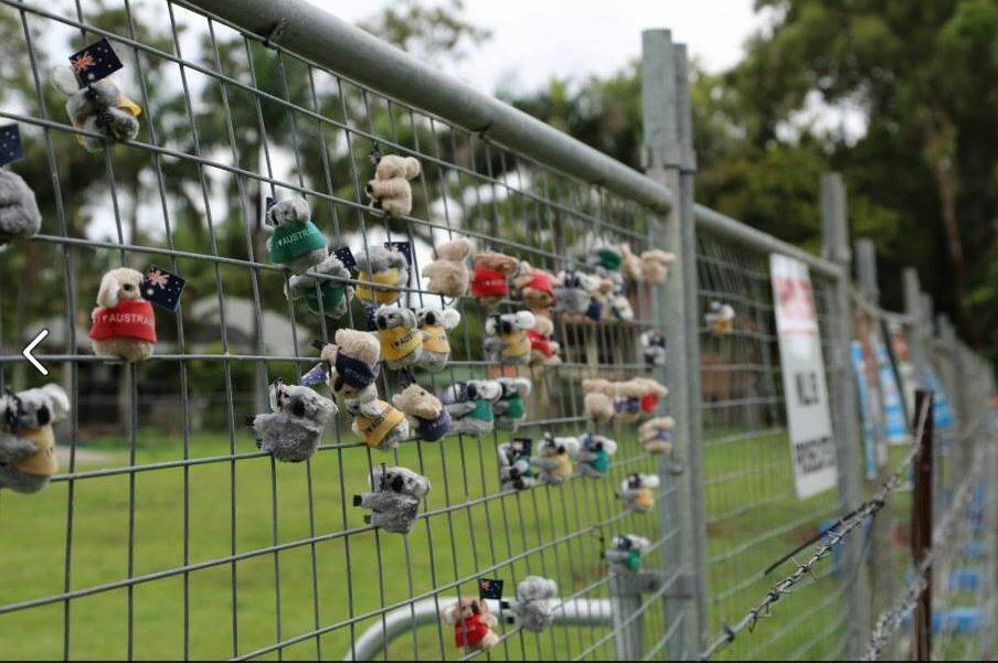 Residents clipped toy koalas on a fence outside the Fiteni Homes development in Ormiston.