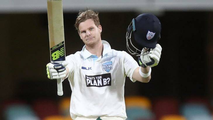Big Blue: NSW captain Steve Smith salutes the crowd after reaching his ton.  Photo: Chris Hyde