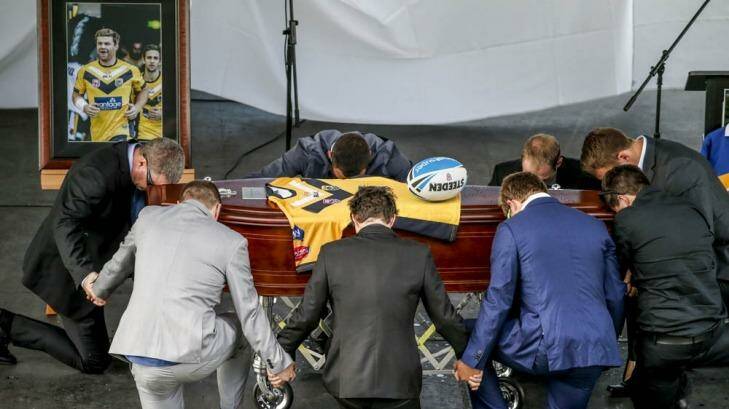 Close to 1000 mourners attended James Ackerman's funeral. Photo: Glenn Hunt