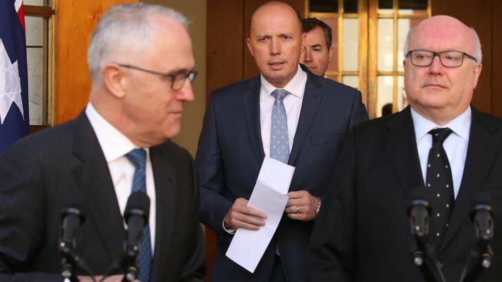 Prime Minister Malcolm Turnbull announced Peter Dutton will become the Minister for Home Affairs at Parliament House in Canberra with Minister Michael Keating and Attorney-General Senator George Brandis on Tuesday 18 July 2017. Photo: Andrew Meares 