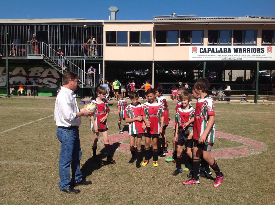 Division 9 councillor Paul Gleeson with Capalaba Warriors Junior Rugby League Club  players. Cr Gleeson has set up a sporting foundation to help needy kids in his electorate play sports.