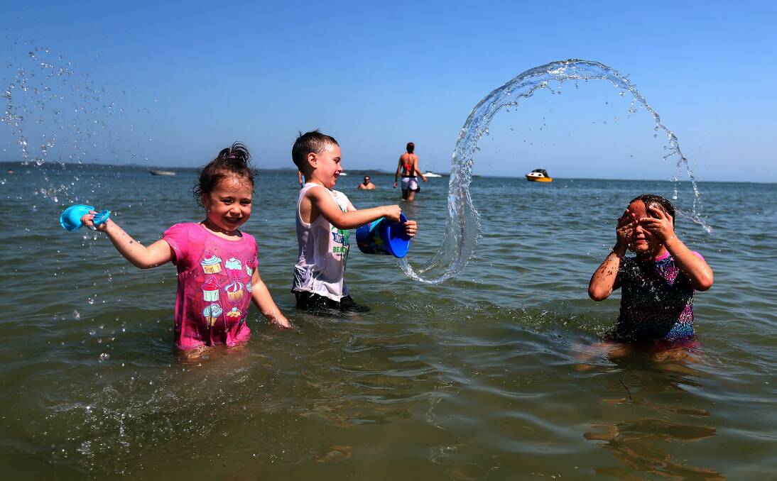 Thompson Beach at Victoria Point was the place to be during the weekend s sweltering weather. Cooling off were Jazmine Rewa (4), of Capalaba, Cadence Vietz (5), of Ipswich, and Tayvin Rewa (6), of Capalaba. Photo by Stephen Archer