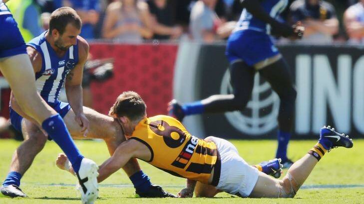 Ouch: Taylor Duryea copped a knee from Ben Cunnington. Photo: Michael Dodge