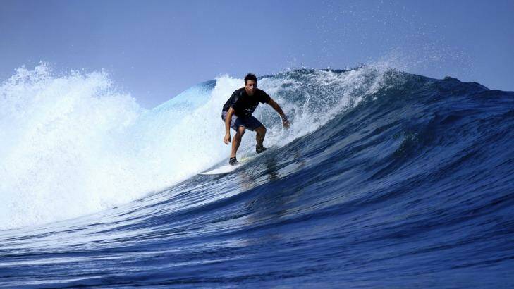 Mark Baguley cuts a mean figure while surfing. Photo: Supplied
