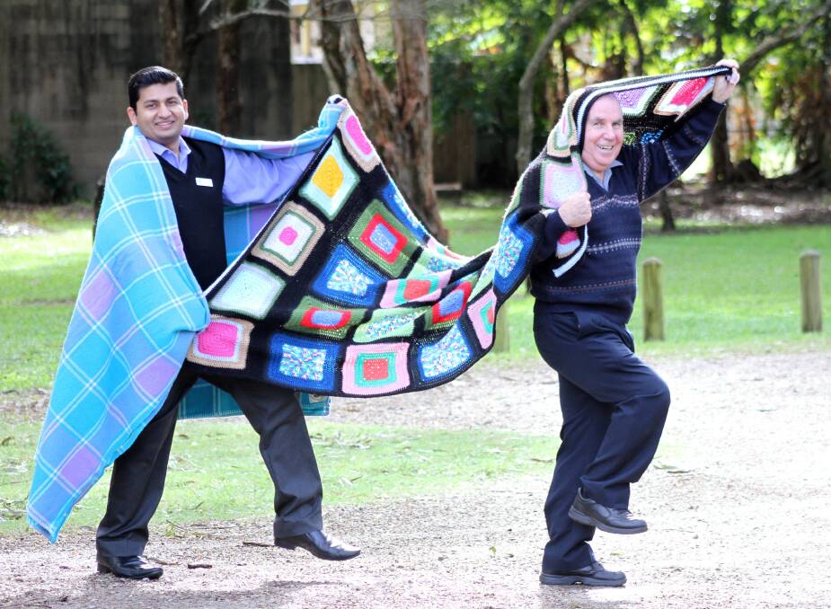Former Donald Simpson Centre manager Ernie Harrison (right) and current manager Thomas Jithin are calling for people to get behind the centre's annual blanket drive and donate blankets for locals in need of some winter warmth. Photo by Chris McCormack