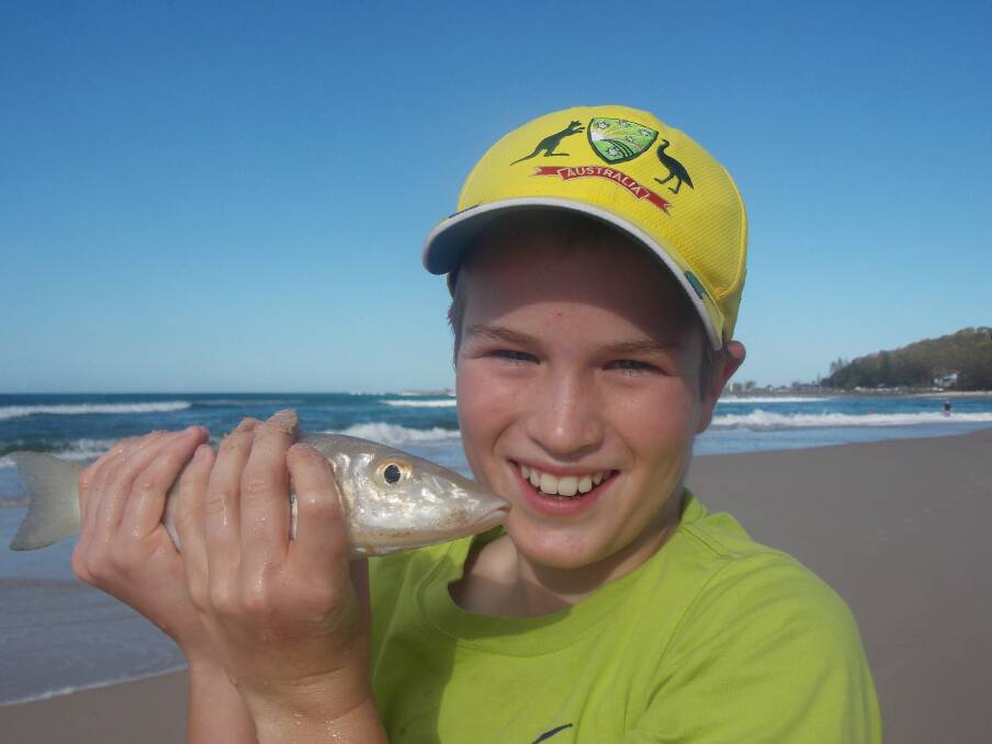 ABOVE: Eleven year-old Charlie Tracey landed this quality whiting from surf at Palm Beach. 
 
RIGHT: Bill Lowe with a solid permit caught on North Stradbroke Island.