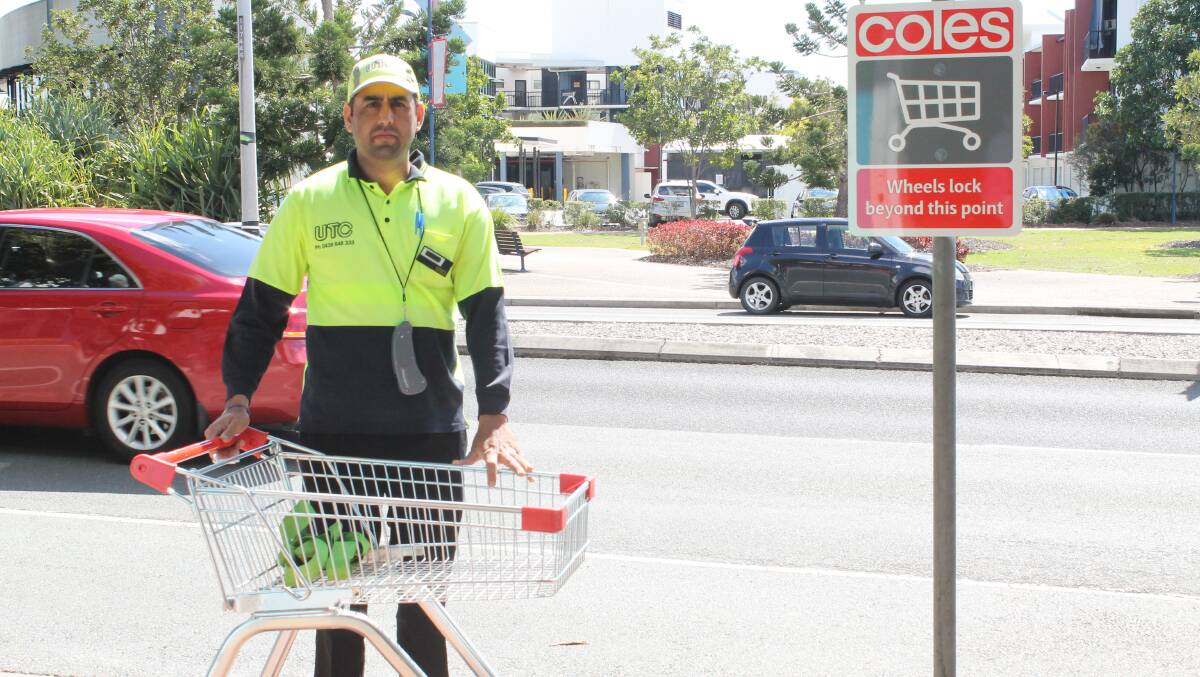 Coles trolley manager Amandeep Singh, who works seven days a week collecting Coles trolleys from the carparks. PHOTO: Judith Kerr 
