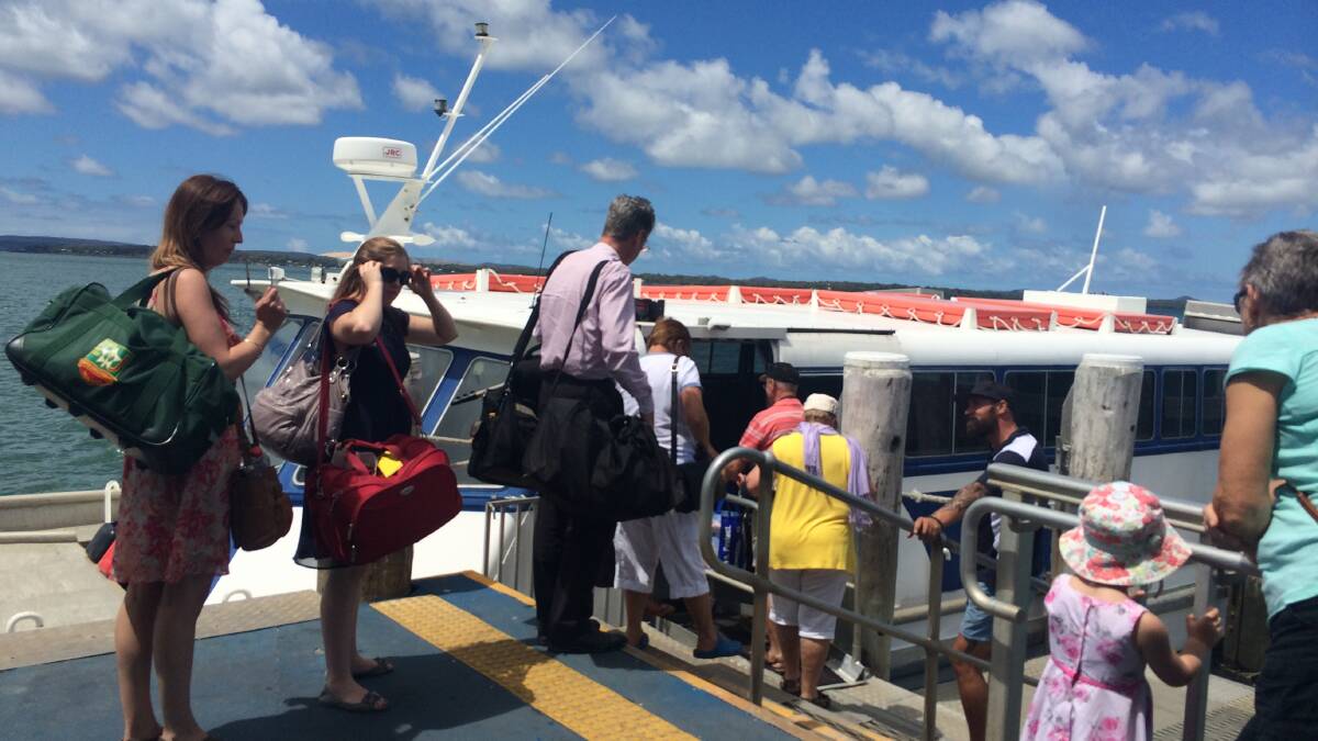 Boarding the ferry at Victoria Point jetty. Waterways Construction has won a $6.3million contract to upgrade jetties and ferry terminals at Coochiemudlo Island and Victoria Point. PHOTO: Judith Kerr 