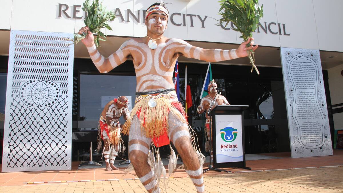 Yulu-Burri-Ba dancer Kyle Coghill dances at the plaque unveiling ceremony which marks a new era in council and indigenous relations. PHOTO: Chris McCormack