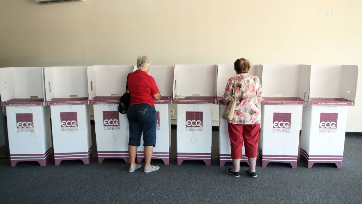 Voters at the Victoria Point pre-polling booth cast their votes in the 2012 Redland City Council election. PHOTOS: Chris McCormack