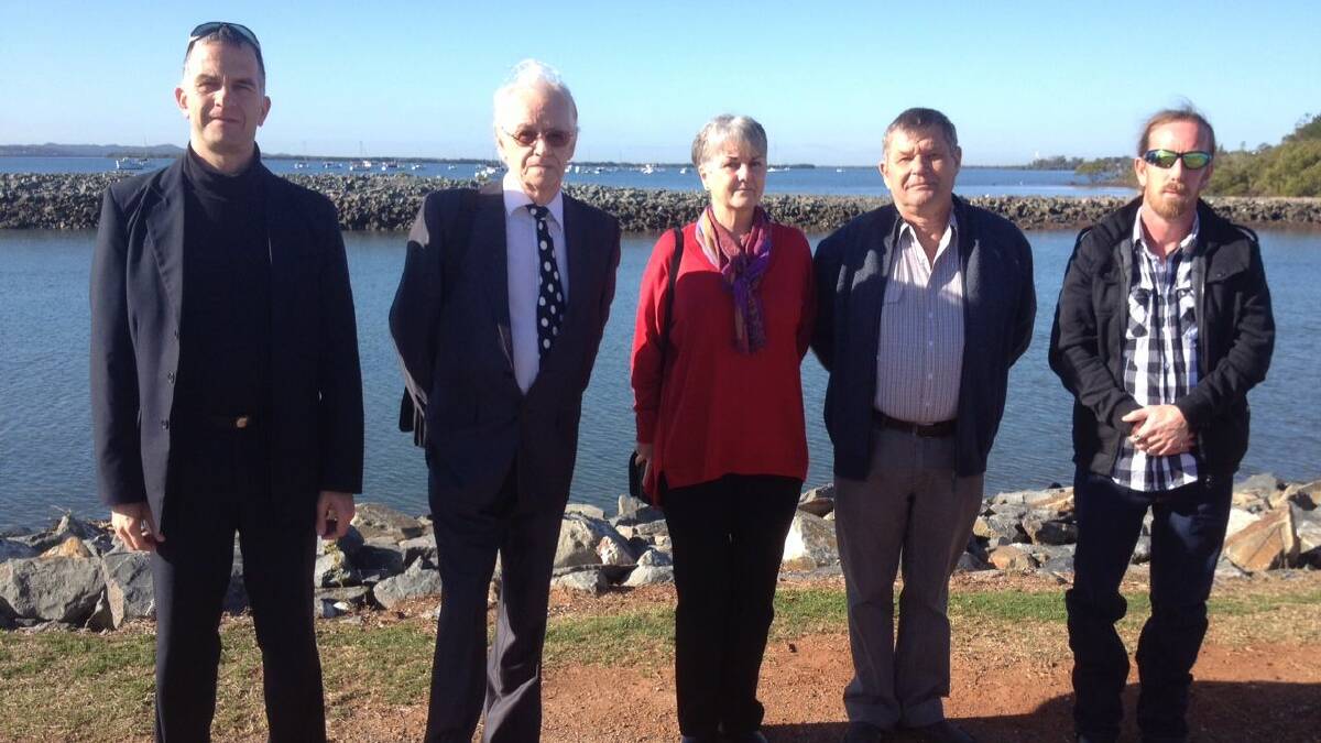 Bridge advocate Clem Ebber, from Lamb Island, second from left, with island residents Greg Hartay-Szabo, Jan and Vic Schut and Chris Connor