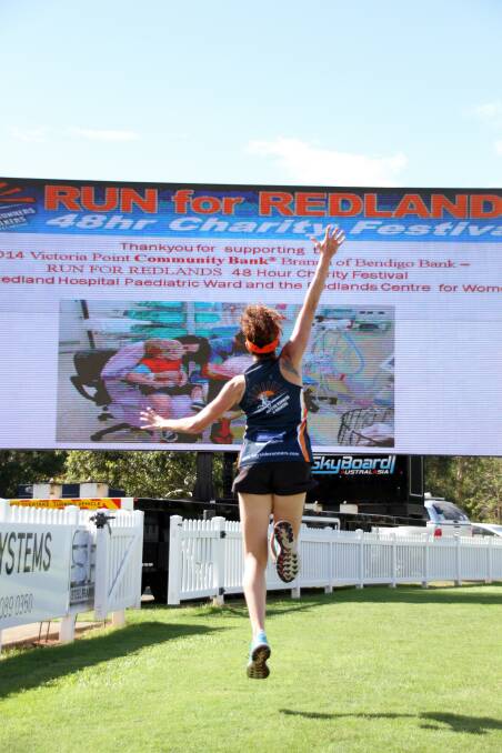 May 23 - Corina Bailey jumps for joy after starting the Run for Redlands 48hr Charity Festival.
Photo by Chris McCormack
