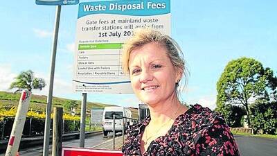 Redland mayor Karen Williams says savings from axing the carbon tax will be passed on to ratepayers but it is still too early to determine how much. 