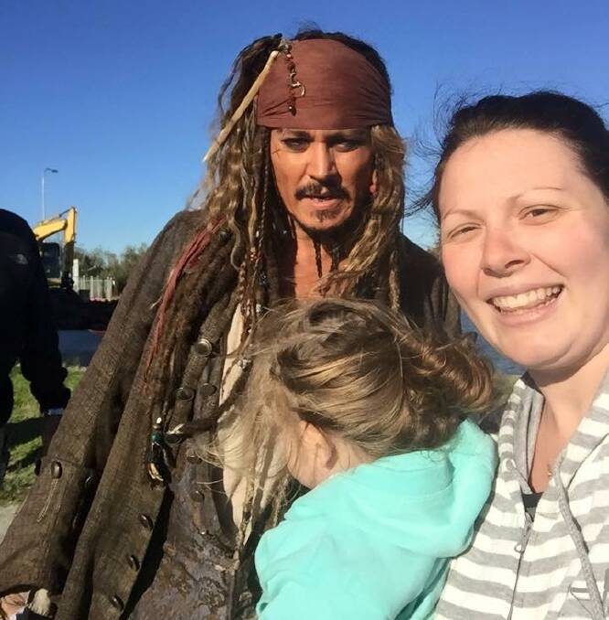 Actor Johnny Depp took time out of his busy schedule to say 'Hi' to Alex Hills mum Kaylynn Ludwig and her daughter Chelsea at Raby Bay. PHOTO: Kaylynn LUDWIG  