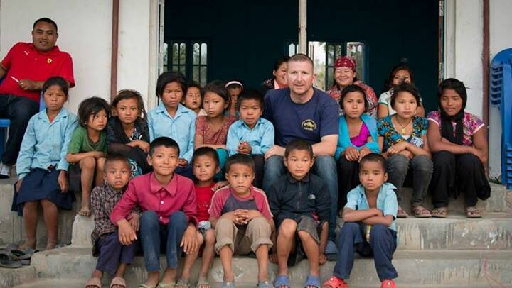 Mick Bentham, who runs the foundation, with some of the orphans at his hostel in Nepal.