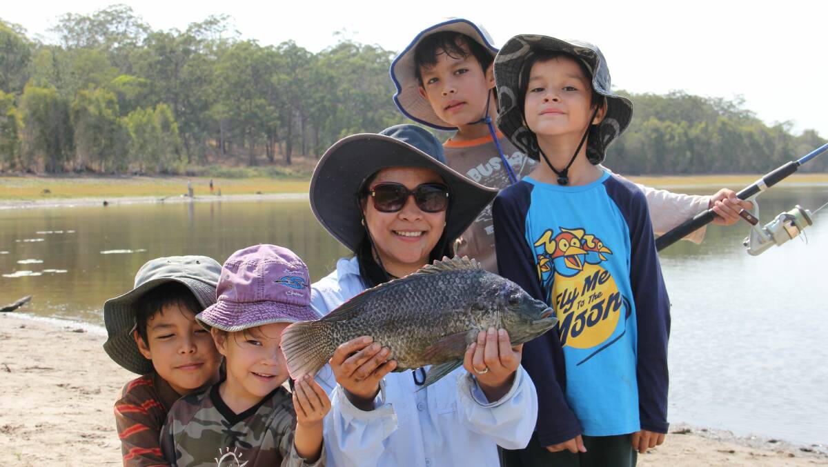 Kids loved throwing in a line at Leslie Harrison Dam on Sunday