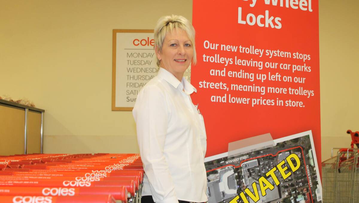 Cleveland Coles store manager Maxine Schipplock says the new locks will save time, money and customer angst. 