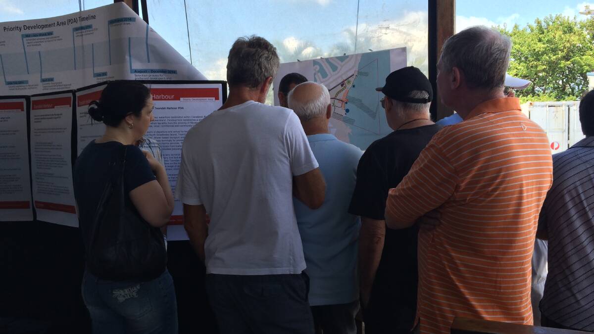People check out the plans for redeveloping Toondah Harbour at Island View Cafe on Saturday. 