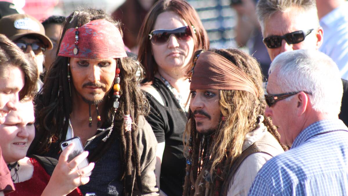 George Prince, left, dressed as Captain Jack Sparrow meets his movie star hero Johnny Depp at Raby Bay