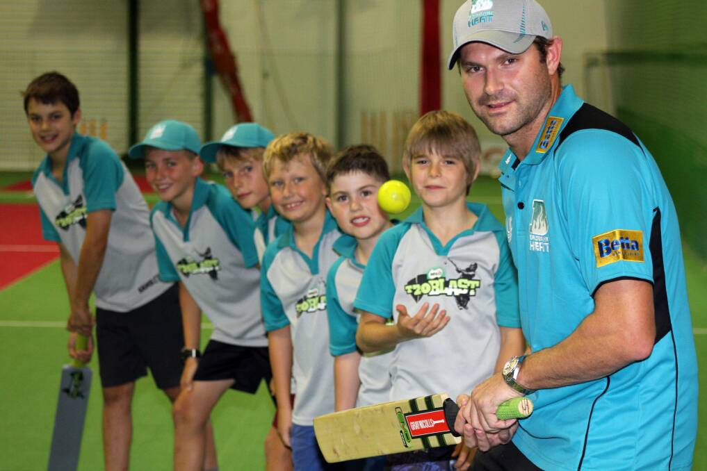 March 25 - T20 Blast program participants from left - Henry Wearing, 10 of Capalaba, Alex Carew, 10 of Cleveland, Luke Edwards, 10 of Victoria Point, Charlie Chase, 7 of Victoria Point, Harrison Morrisby, 7 of Victoria Point and Bailey Donald, 11 of Victoria Point with Australian cricketer Ryan Harris at the Victoria Point Indoor Sports Complex.
Photo by Chris McCormack 