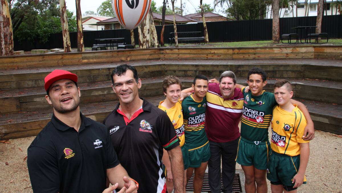 Former Bronco's Jharal Yow Yeh and Chris McKenna with Alexandra Hills State High School students James Keding, 13, Sonny Clay, 15, Tyrees Wilson, 13 and Jayden Clarkson, 12 with Capalaba MP Steve Davies.
Photo by Chris McCormack