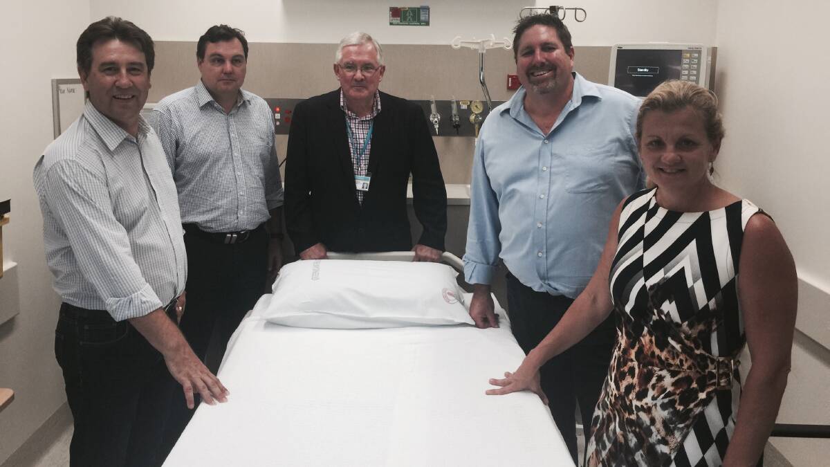 BEDDED DOWN: Redlands mayor Karen Williams with, from left, Cleveland MP Mark Robinson, LNP candidate for Redlands Matt McEachan, Metro South Hospital and Health Service chief executive Dr Richard Ashby and Capalaba MP Steve Davies. 