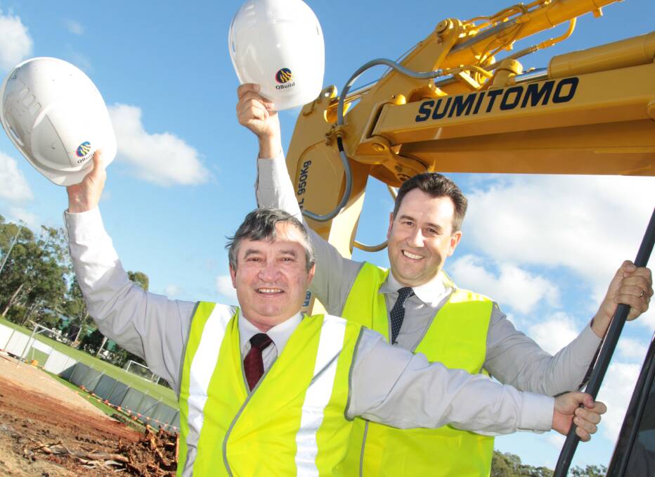 Cleveland District State High School principal Paul Bancroft and Cleveland MP Mark Robinson when work started on the school's new Year 7 building in 2012. PHOTO: Chris McCormack