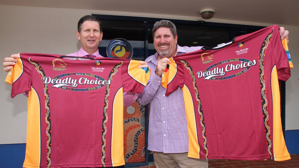 Health Minister Lawrence Springborg and Capalaba MP Steve Davies with their Deadly Choises shirts, which are given to patients at the Yulu-Burri-Ba clinic. PHOTO: Chris McCormack